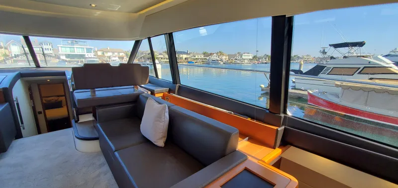 " La Bella Vita" Yacht Photos Pics Luxurious interior of 2017 Prestige 560 Flybridge yacht with marina view.