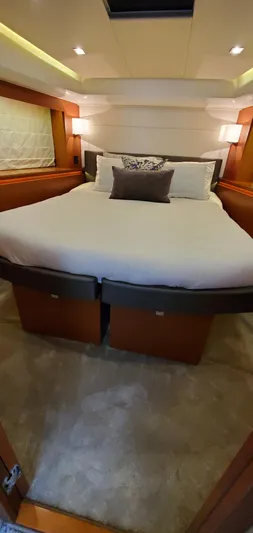 " La Bella Vita" Yacht Photos Pics Luxurious bedroom interior of 2017 Prestige 560 Flybridge yacht with elegant bedding.