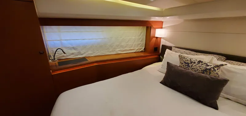 " La Bella Vita" Yacht Photos Pics Luxurious bedroom interior of 2017 Prestige 560 Flybridge yacht with elegant bedding.
