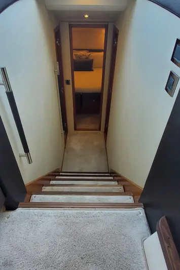" La Bella Vita" Yacht Photos Pics Staircase leading to cabin interior of 2017 Prestige 560 Flybridge yacht.