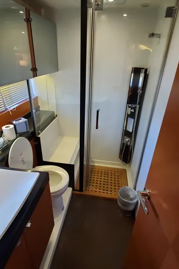 " La Bella Vita" Yacht Photos Pics Luxurious bathroom in 2017 Prestige 560 Flybridge yacht with modern shower and amenities.