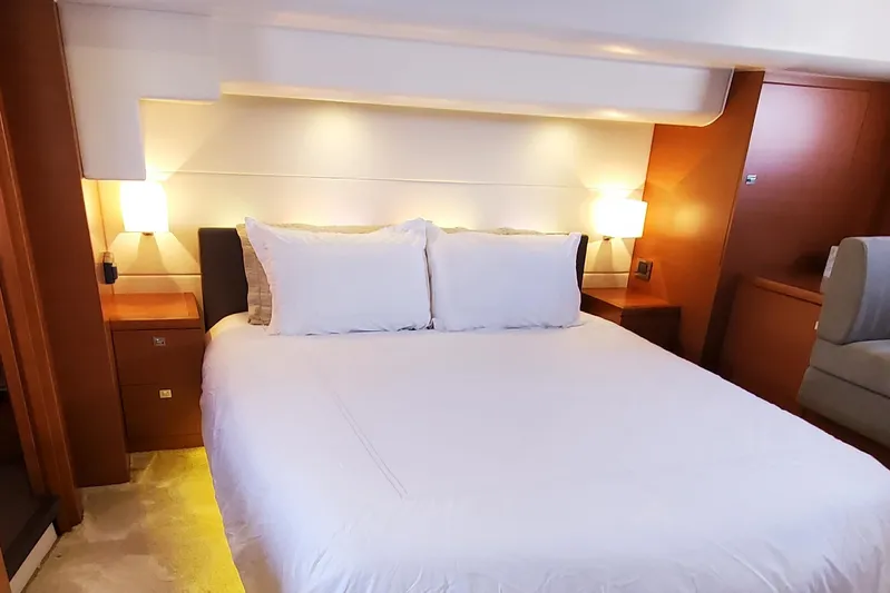 " La Bella Vita" Yacht Photos Pics Luxurious bedroom interior of 2017 Prestige 560 Flybridge yacht with elegant lighting.