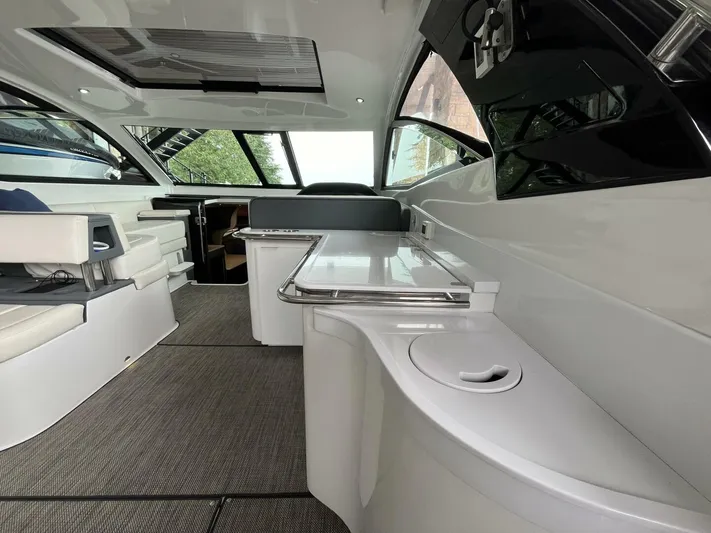  Yacht Photos Pics Interior of a 2016 Cobalt A40 boat, featuring sleek seating and modern design.