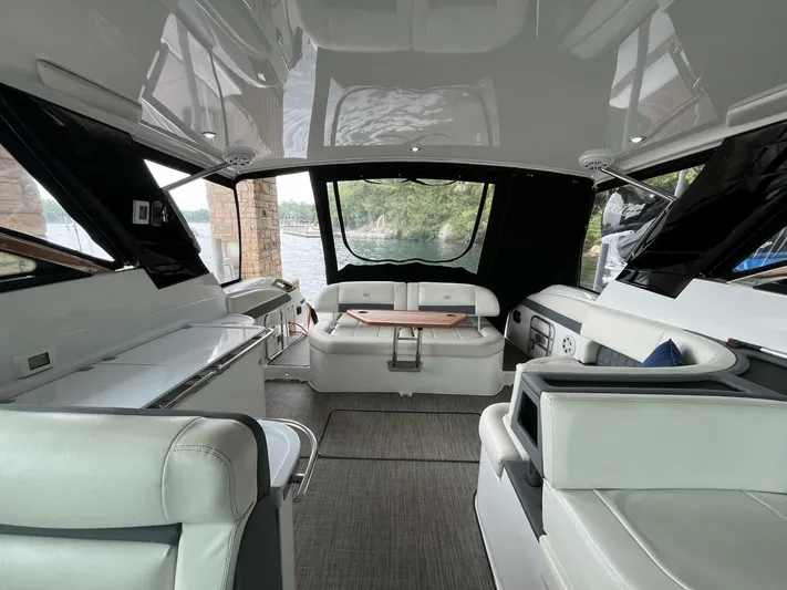  Yacht Photos Pics Luxurious interior of a 2016 Cobalt A40 boat with elegant seating and scenic views.