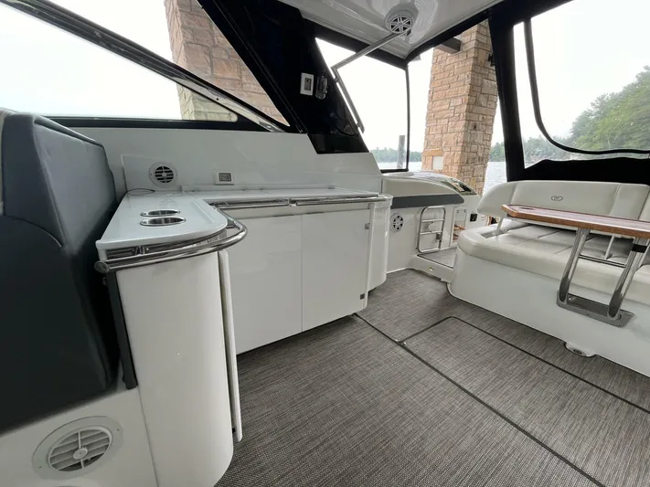  Yacht Photos Pics Interior of a 2016 Cobalt A40 boat, featuring sleek seating and modern amenities.