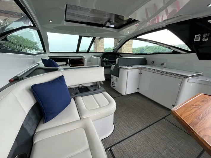  Yacht Photos Pics Luxurious interior of a 2016 Cobalt A40 boat with plush seating and modern amenities.