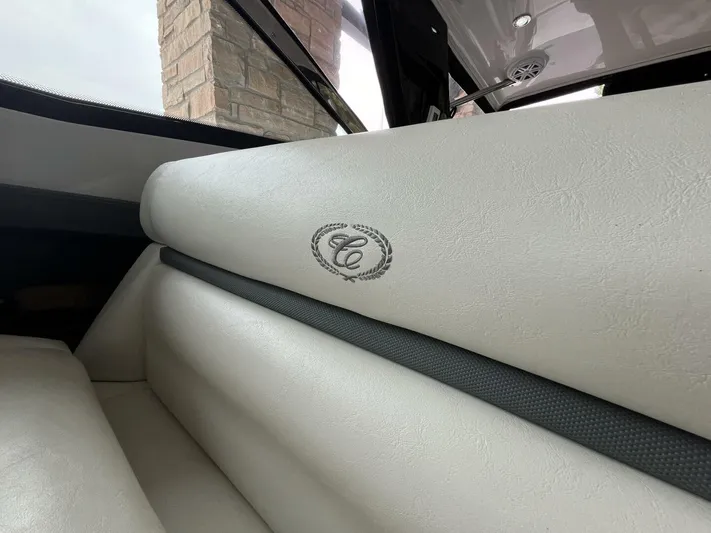  Yacht Photos Pics 2016 Cobalt A40 boat interior with embroidered logo on white leather seating.