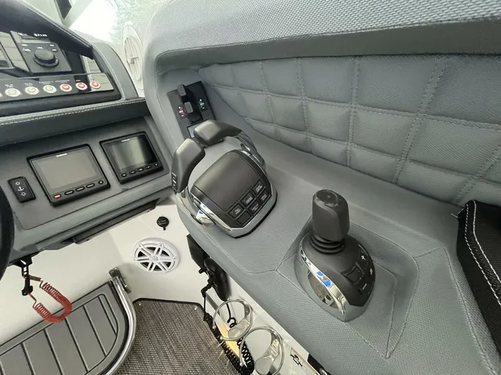  Yacht Photos Pics Control panel of a 2016 Cobalt A40 boat with modern navigation equipment.