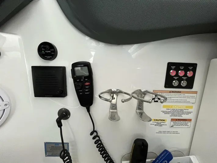  Yacht Photos Pics Control panel of a 2016 Cobalt A40 boat with radio and gauges.