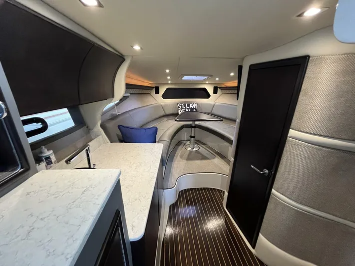  Yacht Photos Pics Luxurious interior of a 2016 Cobalt A40 boat with modern amenities and elegant design.