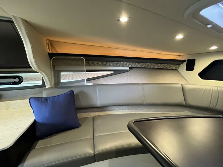  Yacht Photos Pics Luxurious interior of a 2016 Cobalt A40 boat with leather seating and modern lighting.