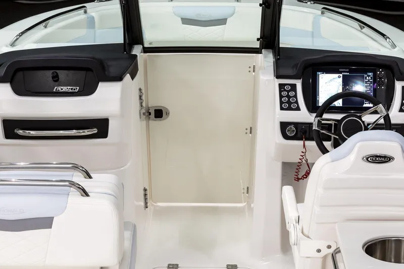 257-117 Yacht Photos Pics Manufacturer Provided Image: 2025 Robalo R257 Dual Console boat interior with modern dashboard and seating.
