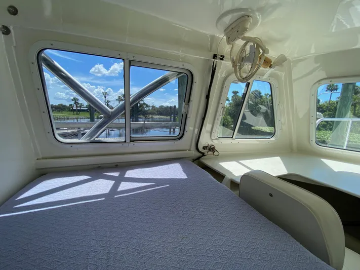 Mirage Yacht Photos Pics Interior of a 1996 Custom 62 boat with scenic window views.