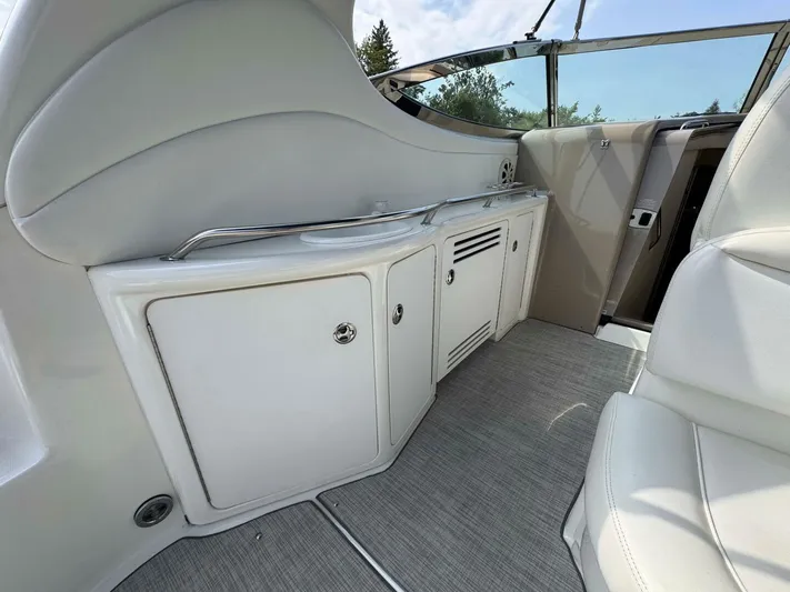  Yacht Photos Pics 2002 Sea Ray 360 Sundancer interior with sleek cabinetry and seating.