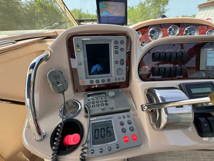  Yacht Photos Pics Control panel of a 2002 Sea Ray 360 Sundancer boat with navigation equipment.
