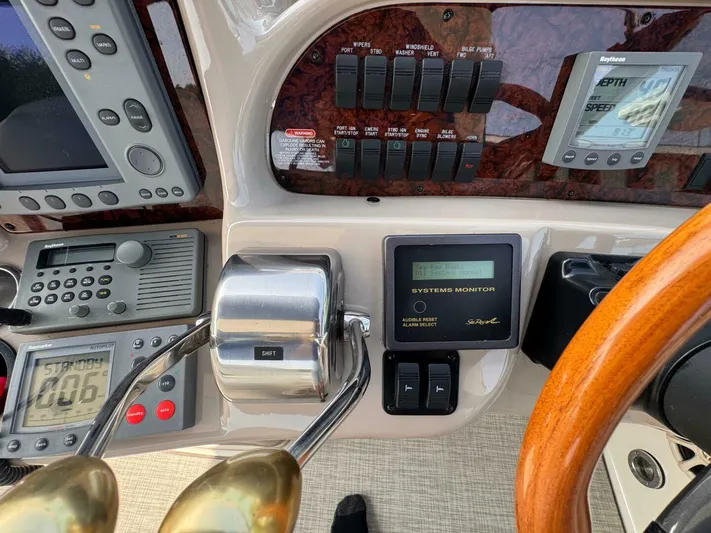  Yacht Photos Pics Control panel of a 2002 Sea Ray 360 Sundancer boat with navigation instruments.