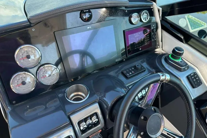  Yacht Photos Pics Dashboard of 2022 Formula 350 Crossover Bowrider OB with gauges and touchscreen controls.
