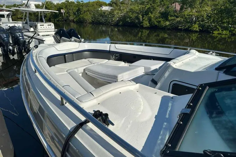  Yacht Photos Pics 2022 Formula 350 Crossover Bowrider OB docked, featuring spacious seating and sleek design.