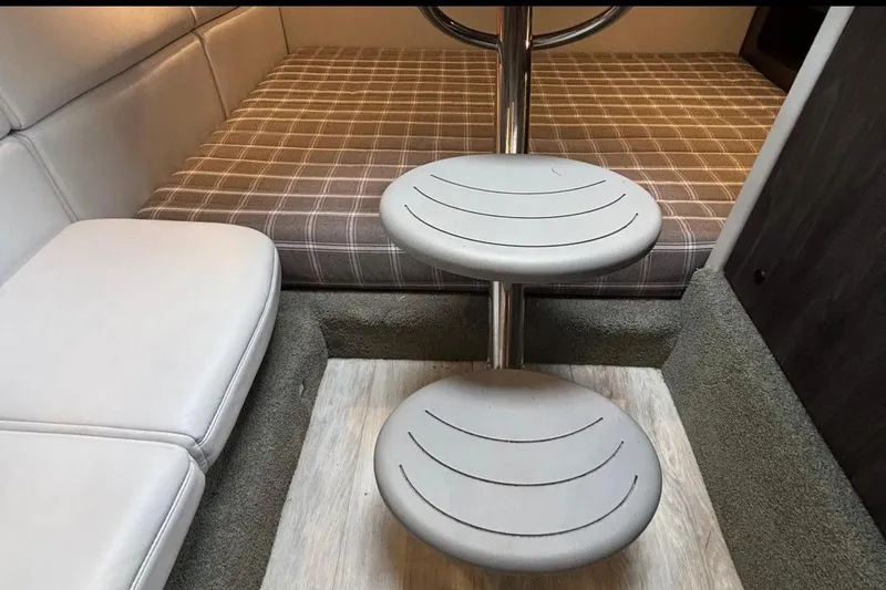  Yacht Photos Pics 2022 Formula 350 Crossover Bowrider OB interior with seating and steps.
