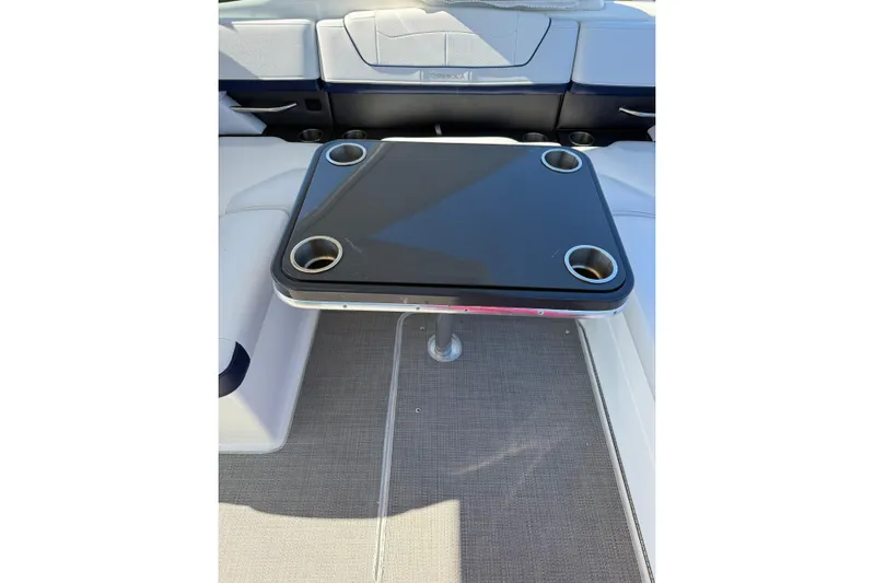  Yacht Photos Pics 2022 Formula 350 Crossover Bowrider OB interior with table and cup holders.