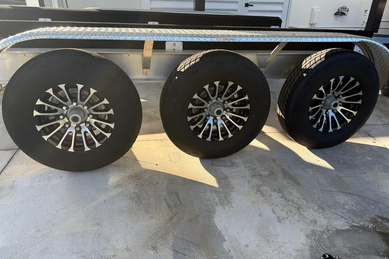  Yacht Photos Pics Triple axle trailer wheels for 2022 Formula 350 Crossover Bowrider OB.