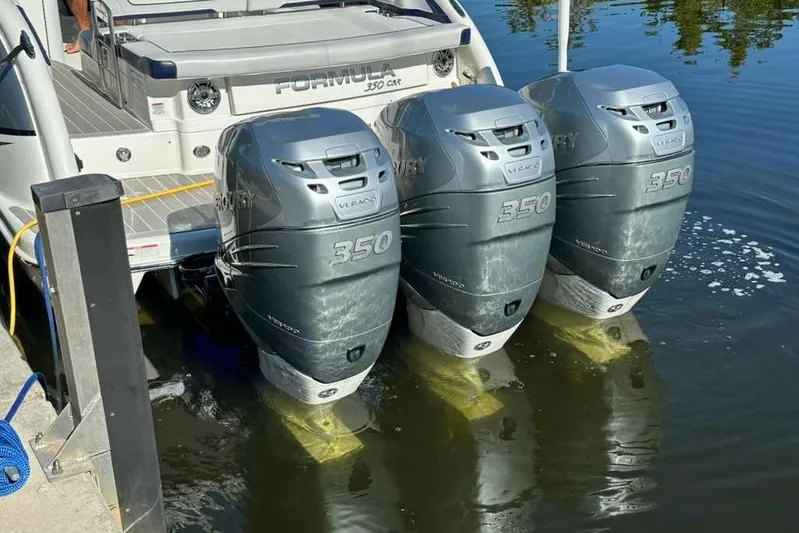  Yacht Photos Pics 2022 Formula 350 Crossover Bowrider OB with triple Mercury 350 engines docked.