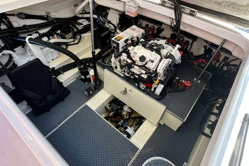  Yacht Photos Pics Engine compartment of 2022 Formula 350 Crossover Bowrider OB, showcasing detailed mechanical components.