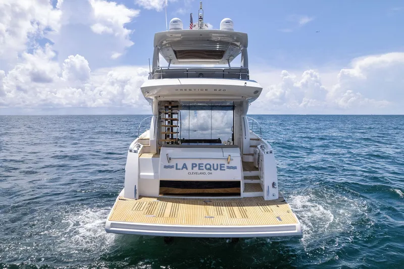 La Peque Yacht Photos Pics 2016 Prestige 620 yacht La Peque on open sea with clear skies.