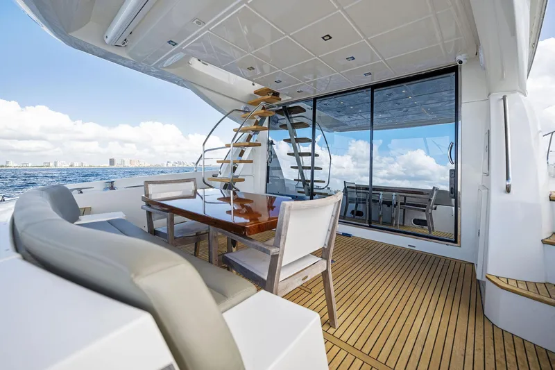 La Peque Yacht Photos Pics Prestige 620 yacht 2016 model, luxurious outdoor seating area with ocean view.
