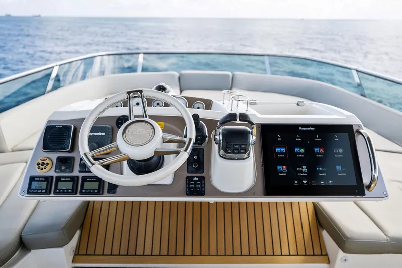 La Peque Yacht Photos Pics Prestige 620 yacht helm station with modern controls and touchscreen display, 2016 model.