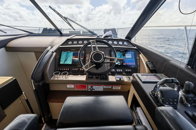 La Peque Yacht Photos Pics Prestige 620 yacht helm station, 2016 model, with advanced navigation controls and ocean view.