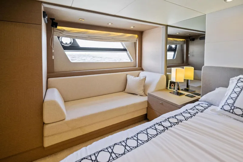 La Peque Yacht Photos Pics Luxurious interior of 2016 Prestige 620 yacht with sofa and bed.
