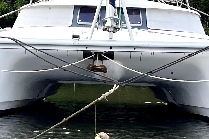 Destiny 2 Yacht Photos Pics Fountaine Pajot Belize 43 catamaran, 2000 model, anchored in calm waters.