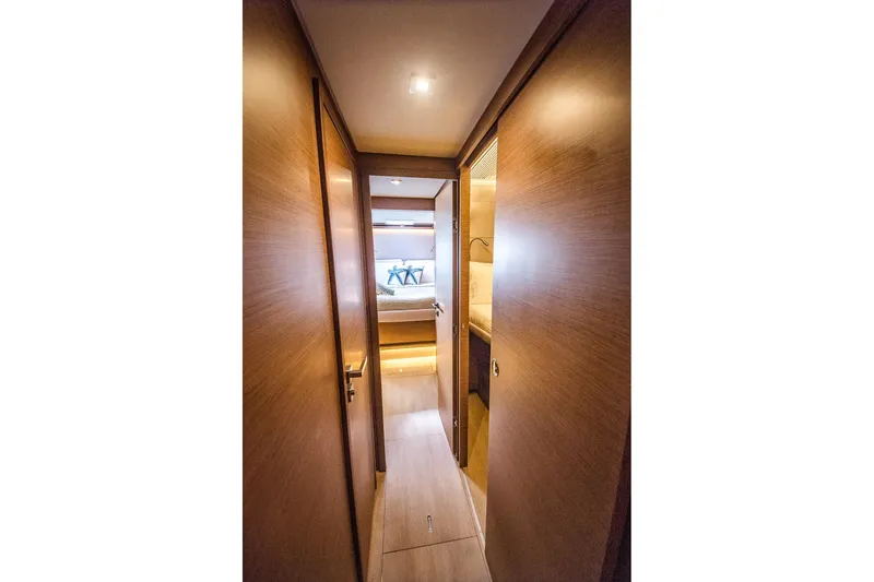 Scuba Doo Yacht Photos Pics Interior hallway of 2020 Lagoon 50 yacht with wooden finish.