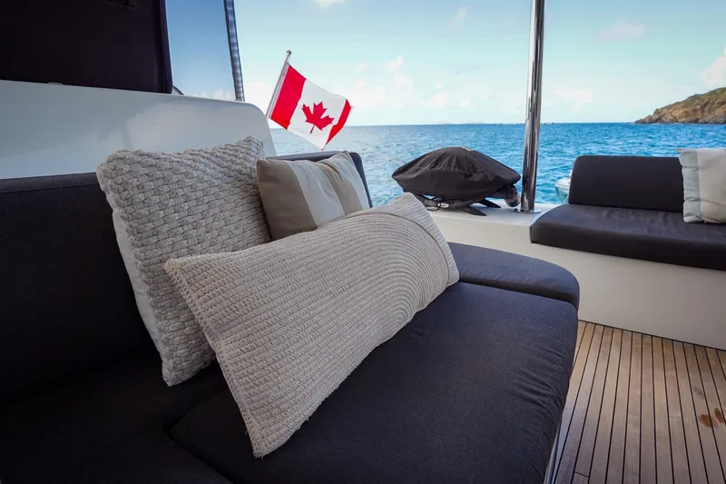 Scuba Doo Yacht Photos Pics Luxurious Lagoon 50 yacht interior with Canadian flag, 2021 model, ocean view.