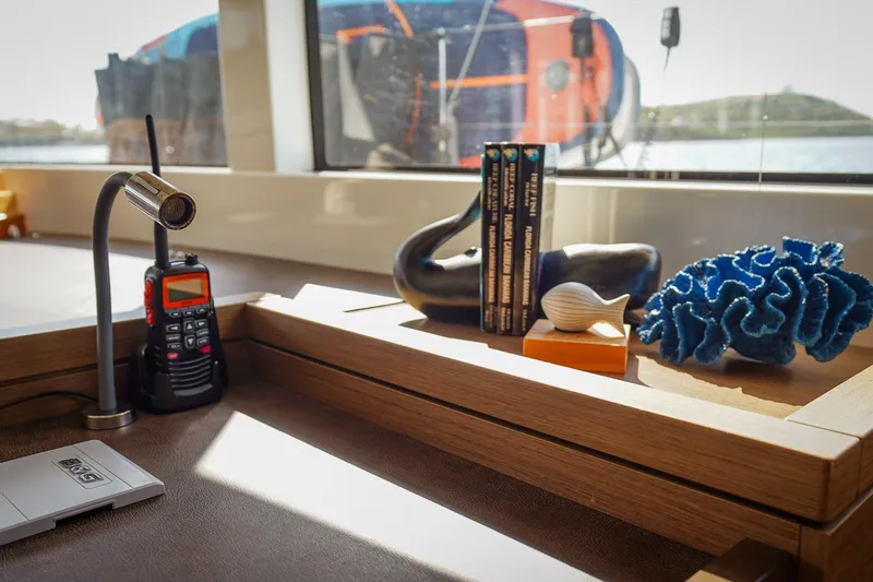 Scuba Doo Yacht Photos Pics Interior of 2021 Lagoon 50 yacht with decor and communication equipment.