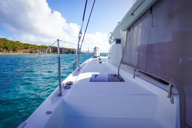 Scuba Doo Yacht Photos Pics Sailing on a 2021 Lagoon 50 catamaran, clear blue waters, sunny day.