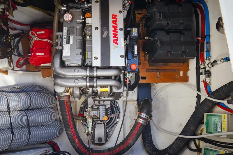 Scuba Doo Yacht Photos Pics Engine room of a 2021 Lagoon 50 catamaran featuring a Yanmar engine.