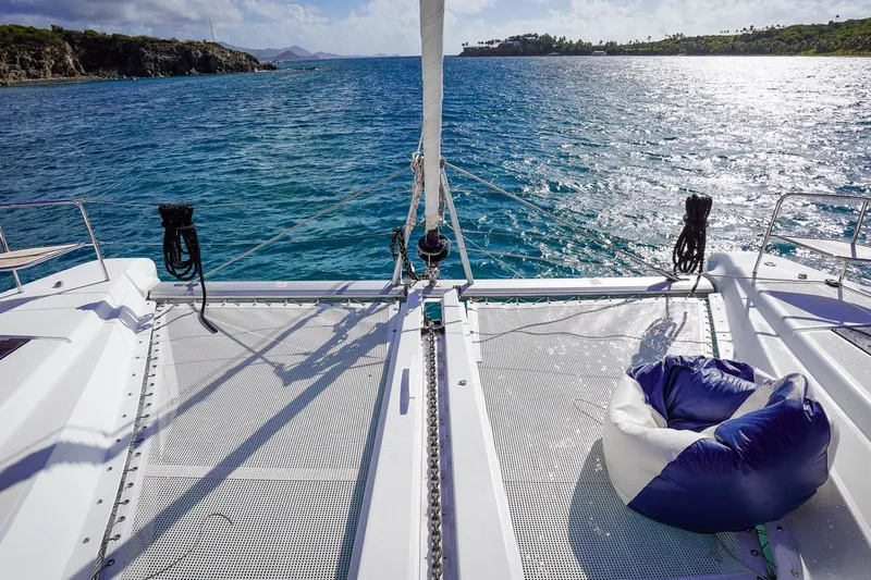 Scuba Doo Yacht Photos Pics Lagoon 50 catamaran deck with ocean view, featuring a bean bag chair, 2021 model.