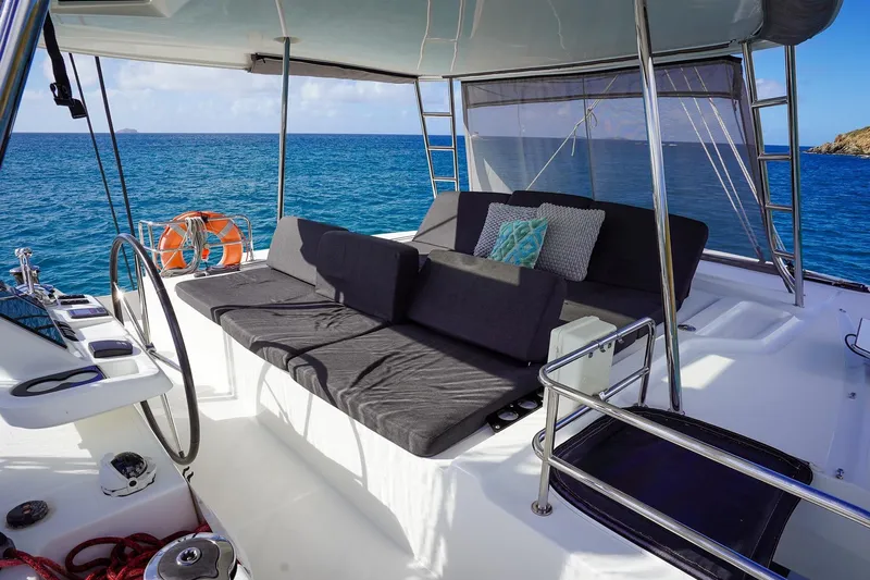 Scuba Doo Yacht Photos Pics Luxurious Lagoon 50 catamaran deck with comfortable seating, ocean view, and modern design, 2021 model.