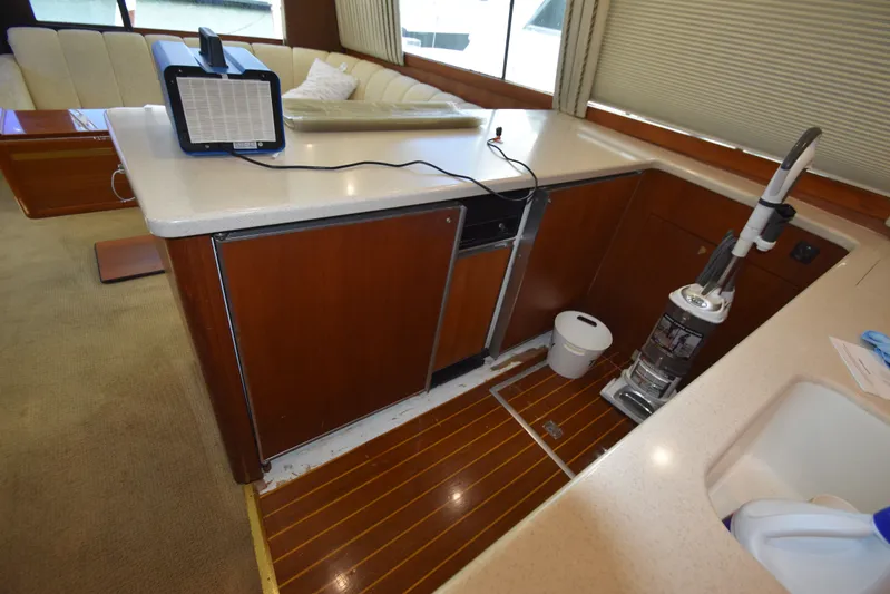 Whaler Yacht Photos Pics Interior of 1997 Ocean 48 Convertible yacht with kitchen area.