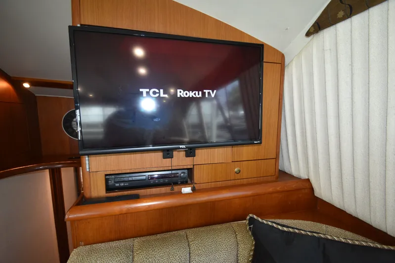 Whaler Yacht Photos Pics Interior of Ocean 48 Convertible yacht with TCL Roku TV.