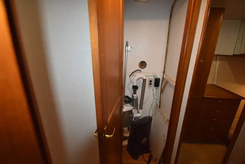 Whaler Yacht Photos Pics Interior of a 1997 Ocean 48 Convertible with storage space.