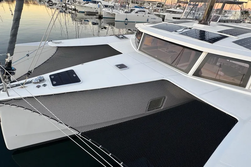 Keizan Yacht Photos Pics 2023 NEEL 43 trimaran with solar panels docked at marina.