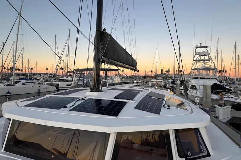 Keizan Yacht Photos Pics Sailboat with solar panels docked at sunset, NEEL 43 model, 2023.