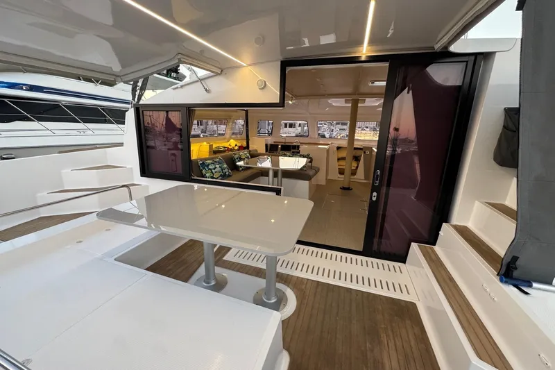 Keizan Yacht Photos Pics Modern NEEL 43 yacht interior with sleek design, spacious seating, and elegant dining area, 2023 model.