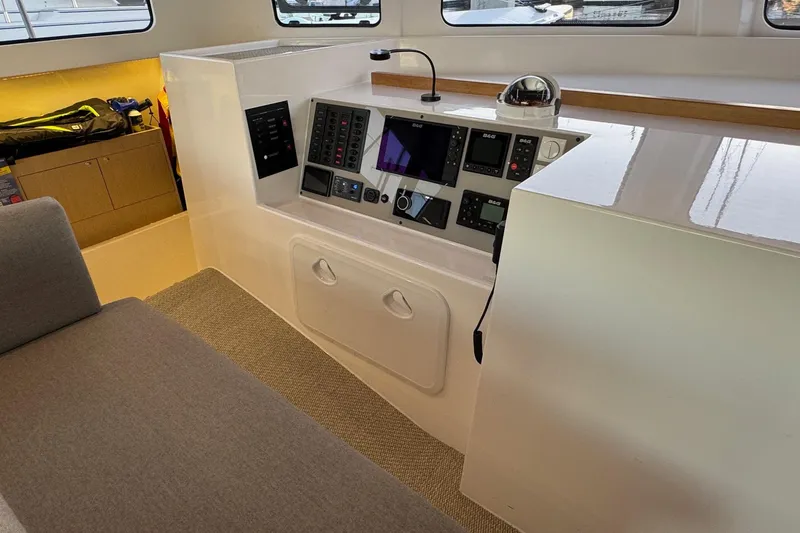 Keizan Yacht Photos Pics Modern NEEL 43 yacht interior helm station with navigation controls, 2023 model.