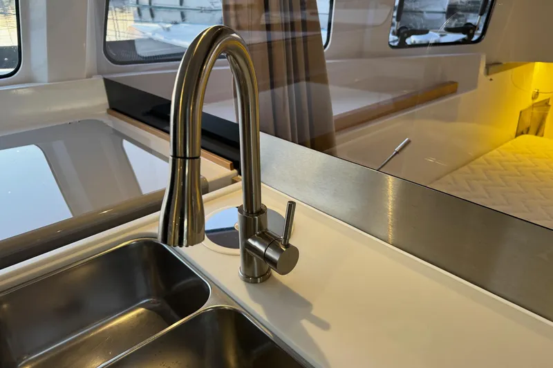 Keizan Yacht Photos Pics Modern kitchen sink and faucet in 2023 NEEL 43 yacht interior.