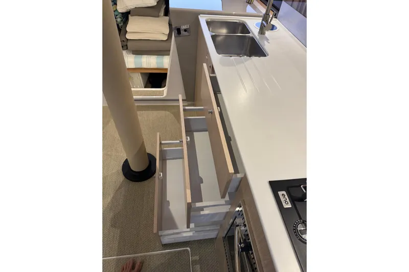 Keizan Yacht Photos Pics Modern kitchen area in NEEL 43, 2023 model, featuring sleek drawers and dual sink.