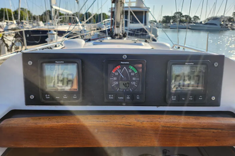 Runaway Yacht Photos Pics Control panel of a 2005 Elan 40 sailboat with Raymarine instruments.